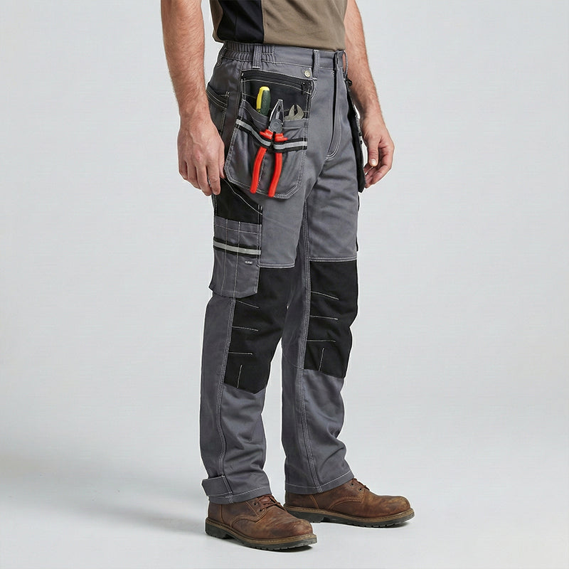 Bottom View of model wearing B111 cotton cargo work pants with knee pad installation and multi-layered pockets